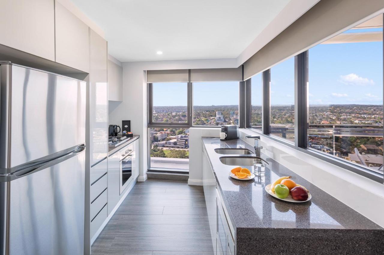 Meriton Suites Church Street, Parramatta Сидней Экстерьер фото The kitchen of a typical apartment